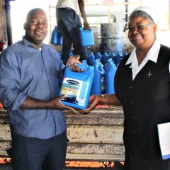 2020.3.Corona.rev.-simbarashe-ndlovu-receives-a-consignment-for-gokwe-diocese-from-zcbc-health-coordinator-sr.-salome-mateko